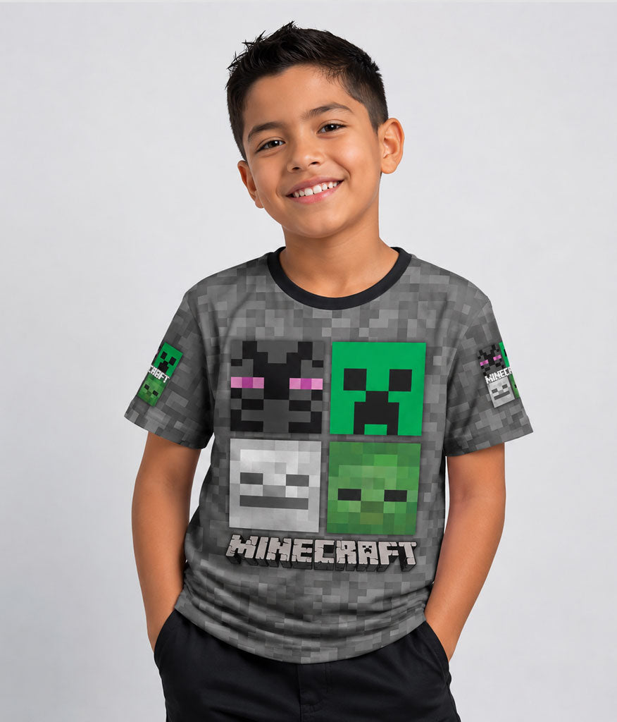 Camiseta gris y verde para niños con el icónico rostro pixelado del Creeper de Minecraft en el centro